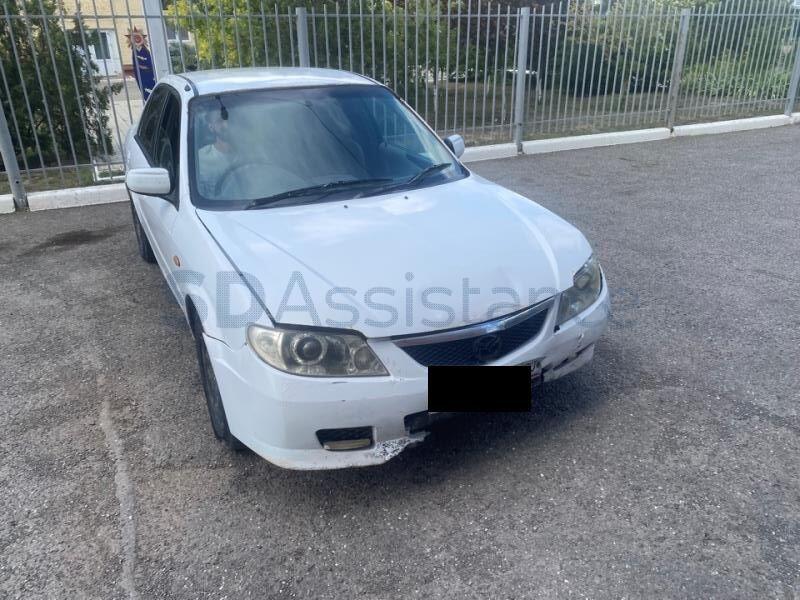 Mazda Familia 2002 г